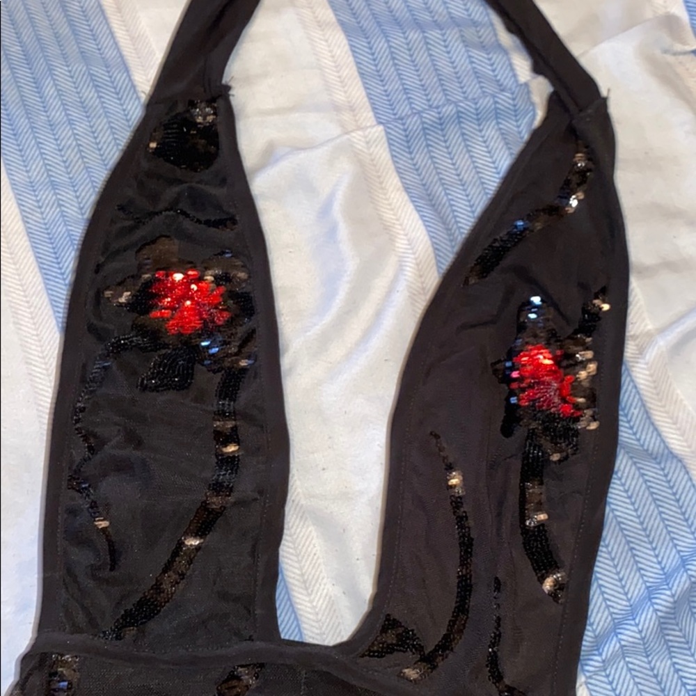 Beautiful sequin open back jumpsuit.